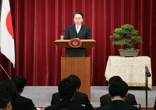 Photograph of the Prime Minister Holding a Press Conference
